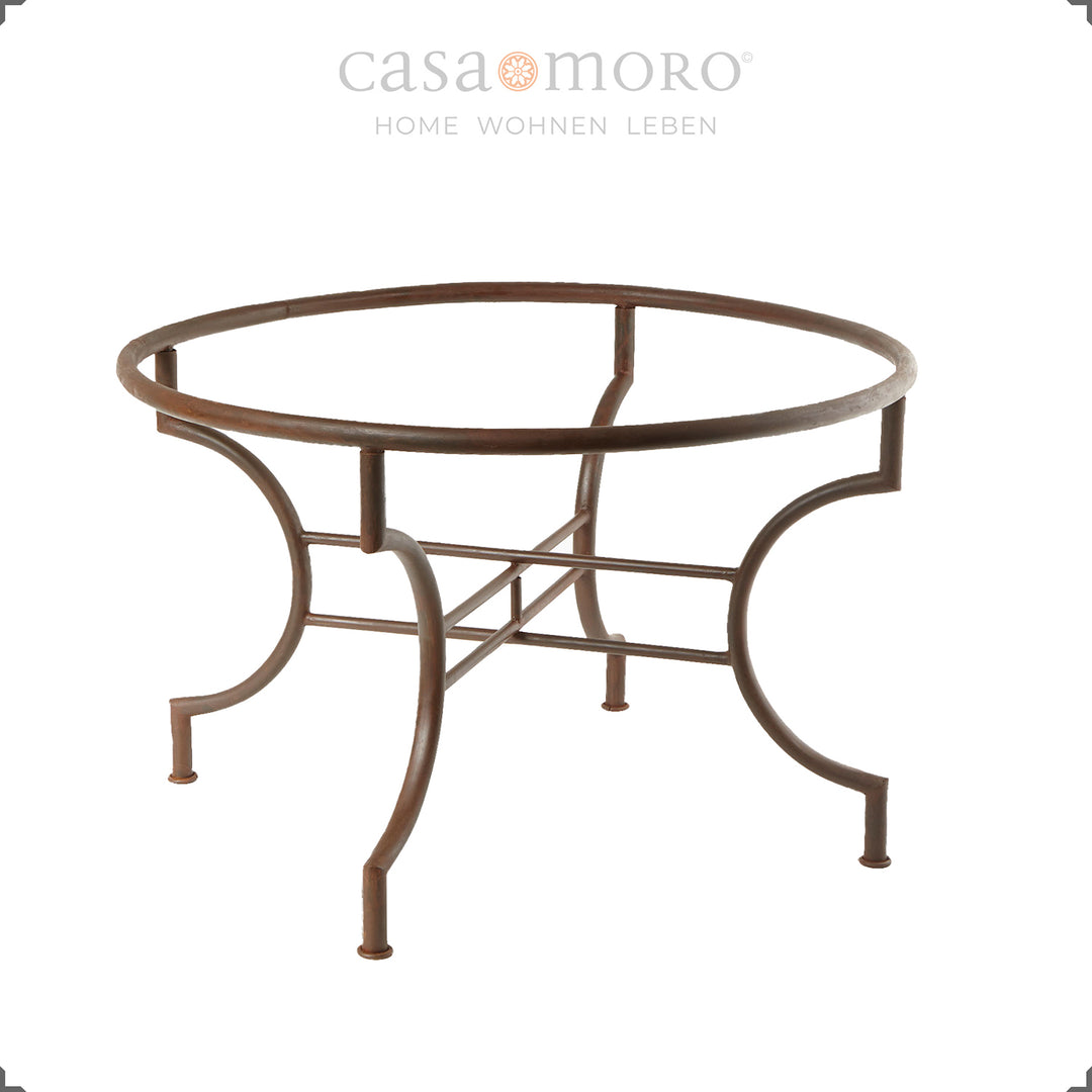 Artfully curved table frame in a patina look with clear varnish sealing