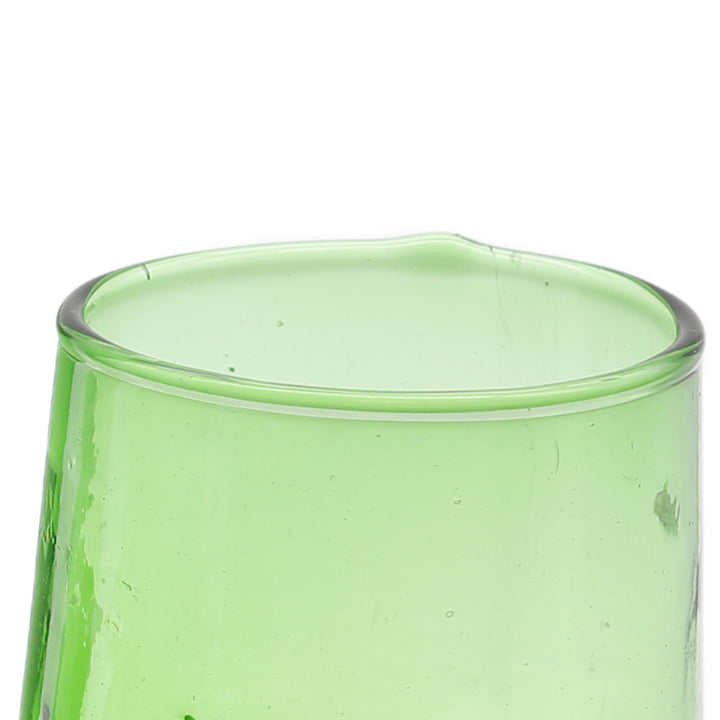 Glasses with iced coffee, latte macchiato and fresh ingredients - served in a summery atmosphere