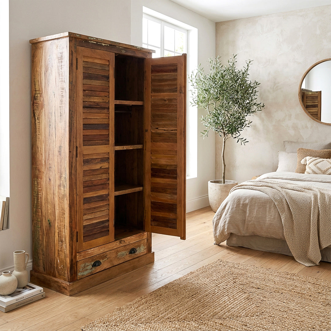 Bedroom cupboard made of solid wood and reclaimed wood in a country house style with a vintage look