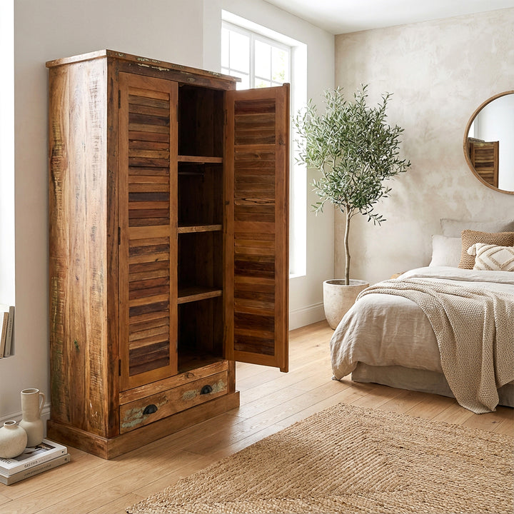 Bedroom cupboard made of solid wood and reclaimed wood in a country house style with a vintage look