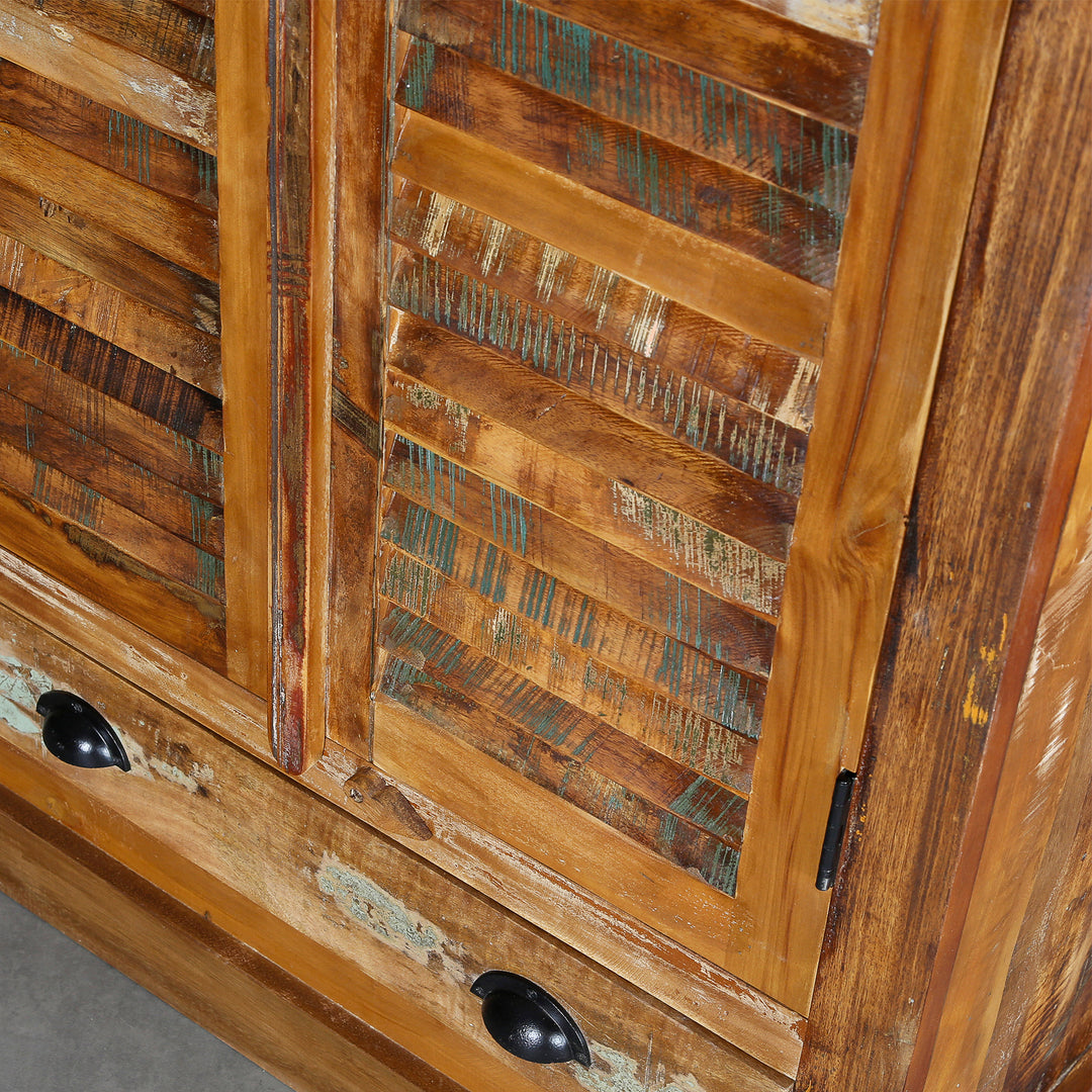 Detailed view of a cabinet made of solid wood and reclaimed wood in vintage style