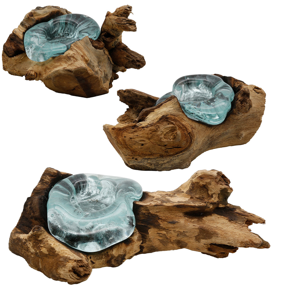 Three variants of the tea light holder made of glass and root wood, each with an individual shape and handmade character.