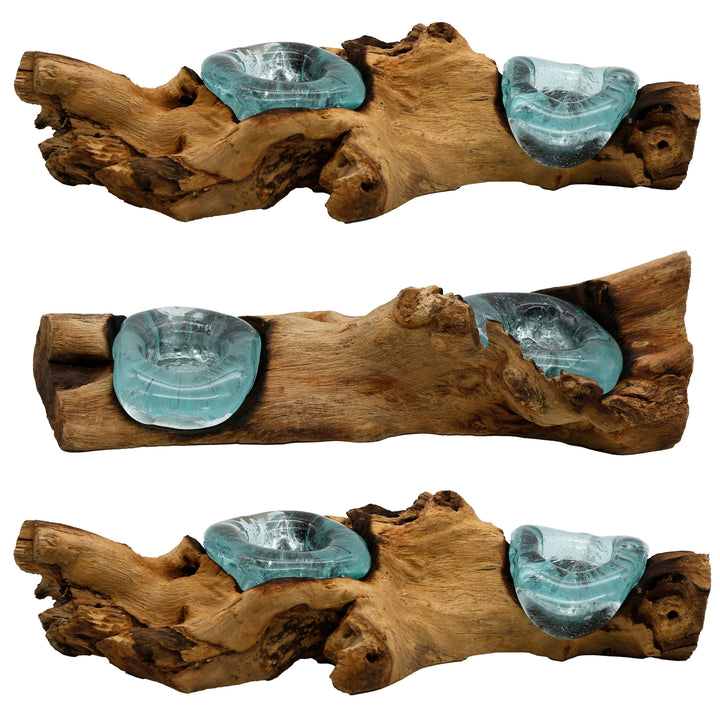 Three variants of the elongated tealight holder made of glass and burl wood, each with an individual shape and handmade character.