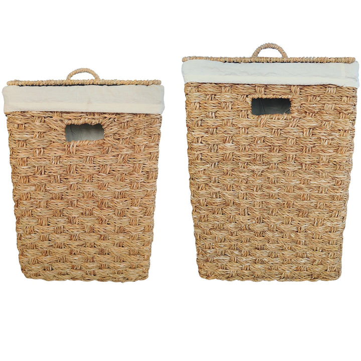Set of 2 square seagrass laundry baskets, approximately 55 and 85 liters, with closed lids and light-colored fabric inserts.