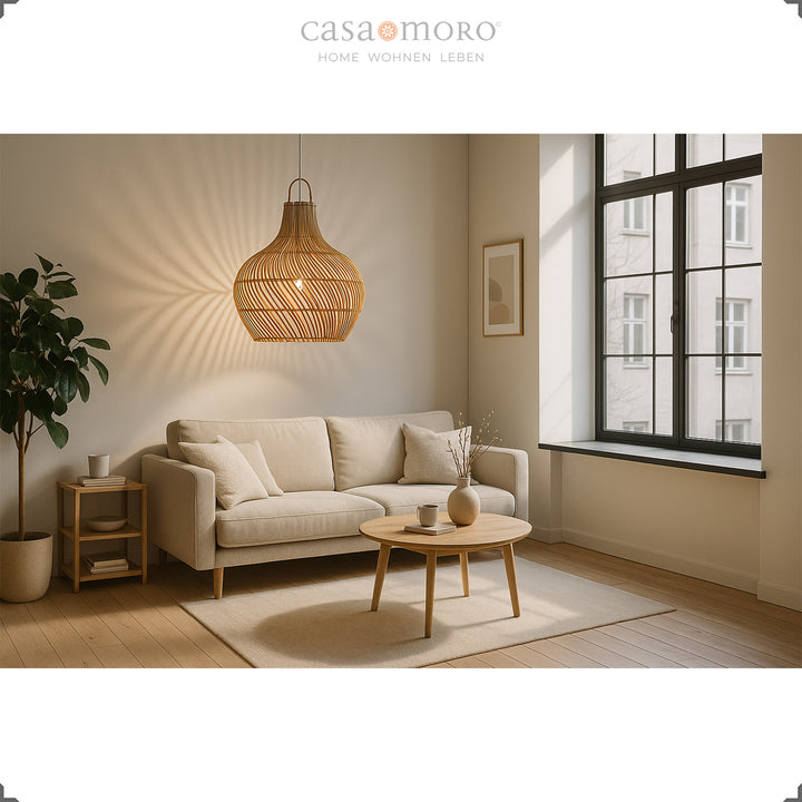 Handmade rattan lamp as a ceiling light in the modern living room, with soft light and a natural atmosphere